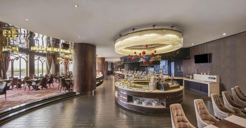 Maison New Century Hotel Dongguan Dongguan  Exteriör bild