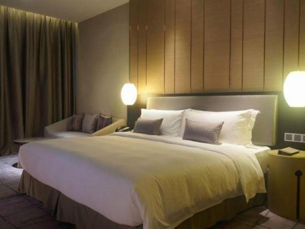 Maison New Century Hotel Dongguan Dongguan  Exteriör bild