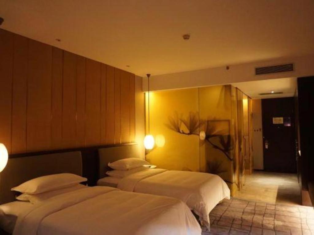 Maison New Century Hotel Dongguan Dongguan  Exteriör bild